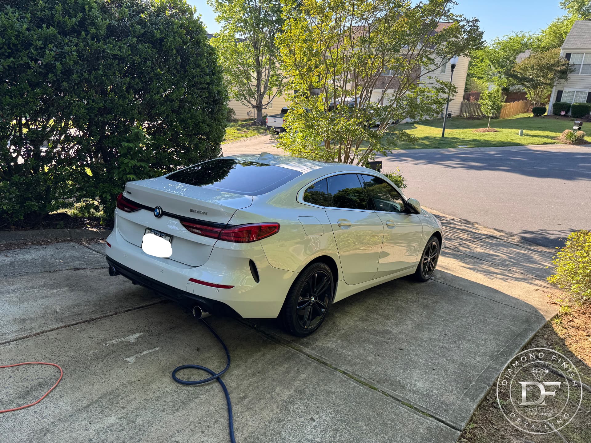 Detailed white BMW 2 Series rear view